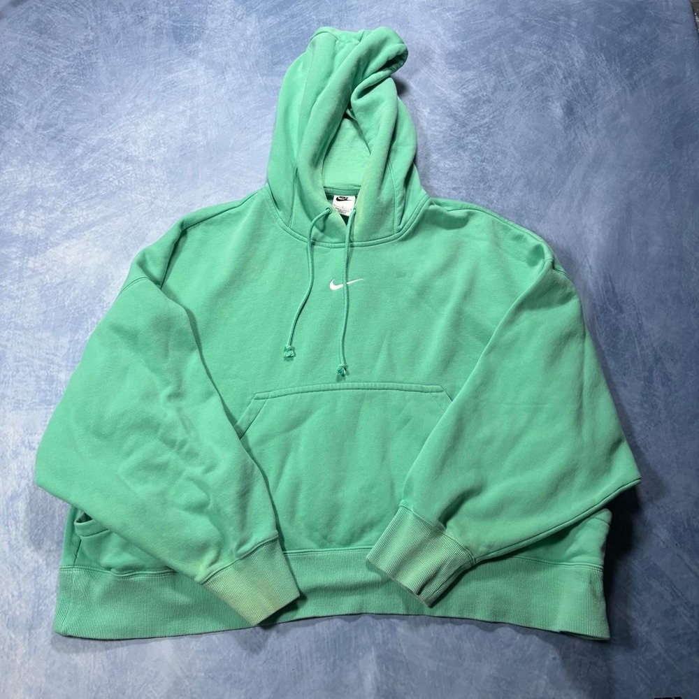 Nike oversized hoodie looks green but is turquoise.
